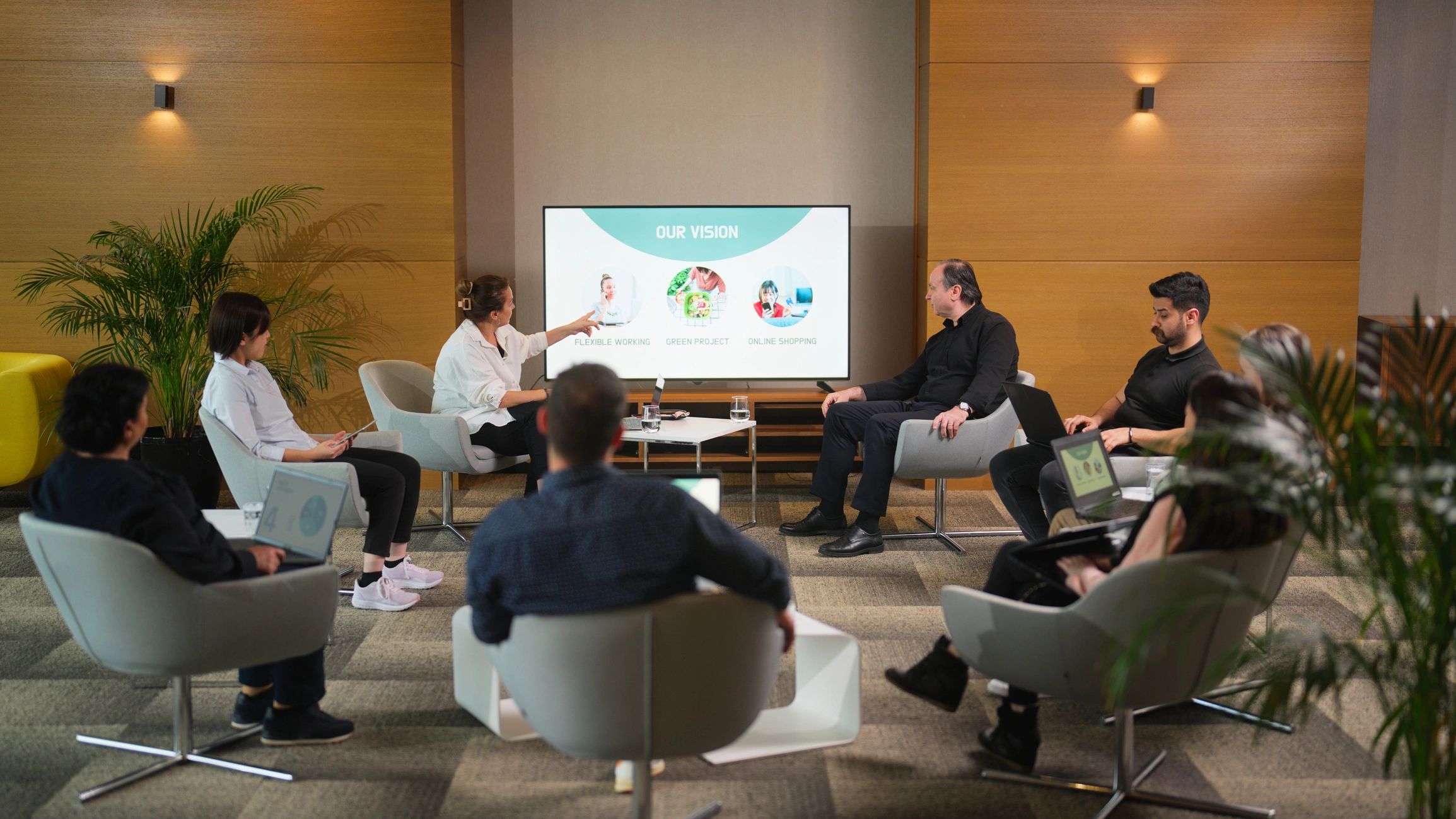Business team gathered during a meeting presentation