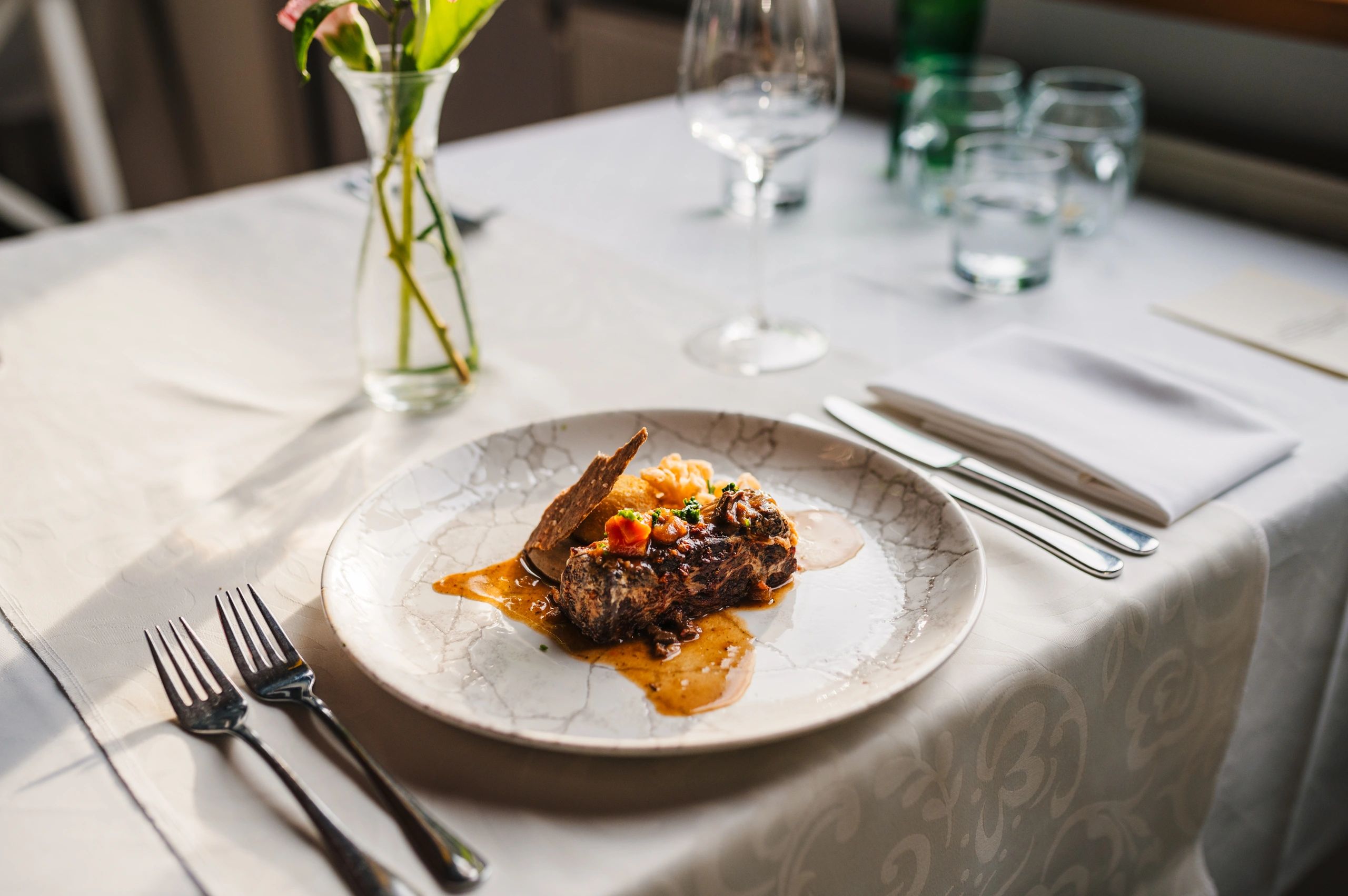Fine dining dish plated in a minimal style