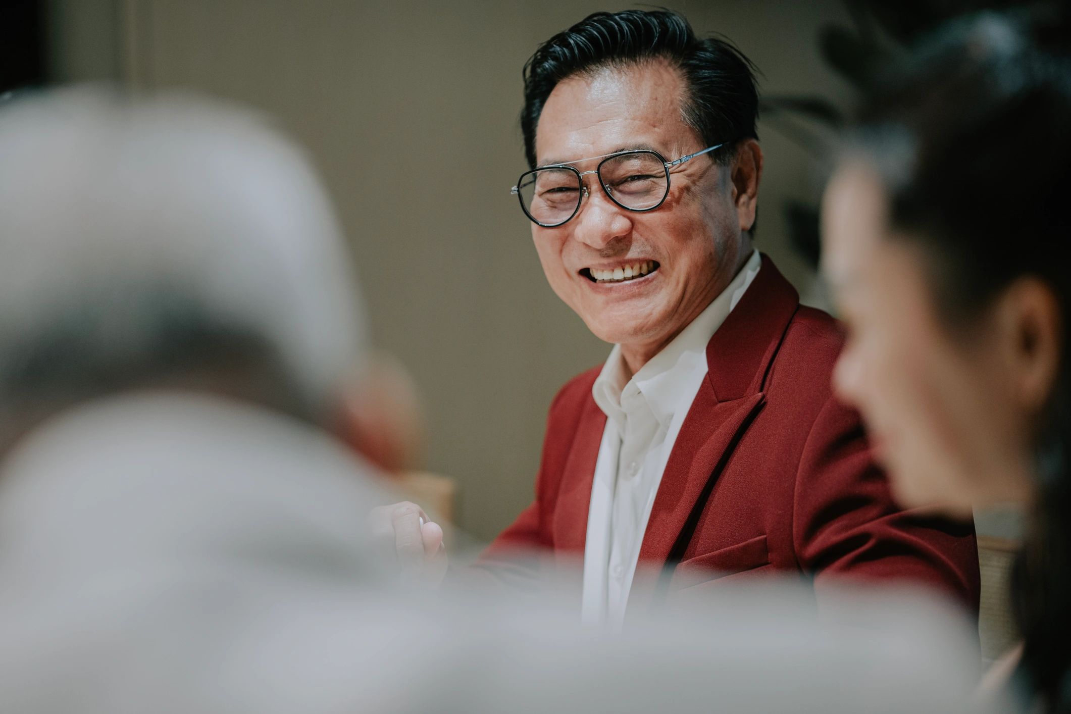Smiling guest at a dining event used as testimonial avatar