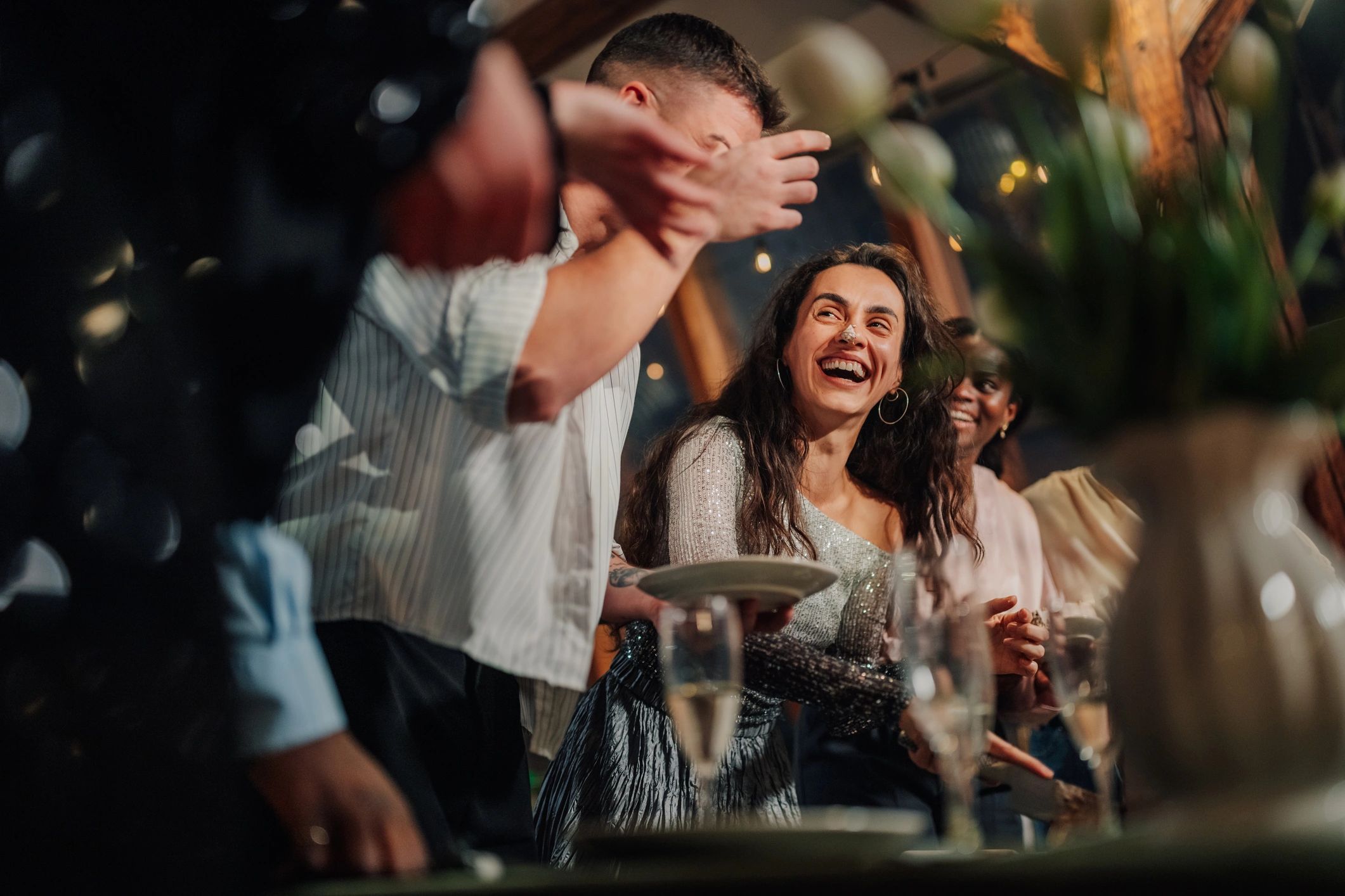Candid moment at an elegant social gathering